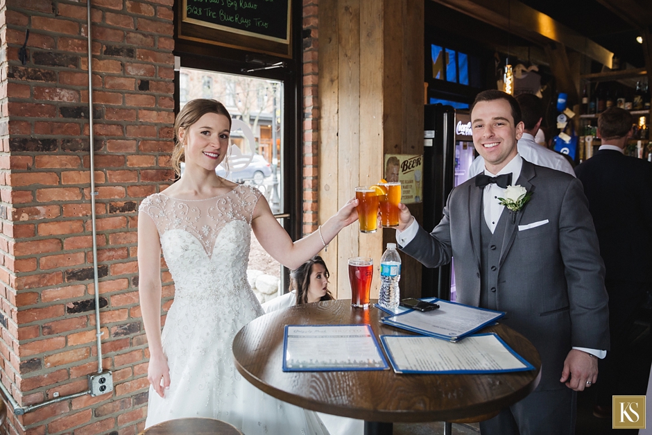 Bride and Groom at bar with beer