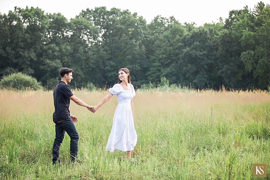 Stony Creek Metropark Engagement pictures in the tall grass